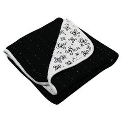 HonestBaby reversible design with print and solid sides enables chic nursery looks.