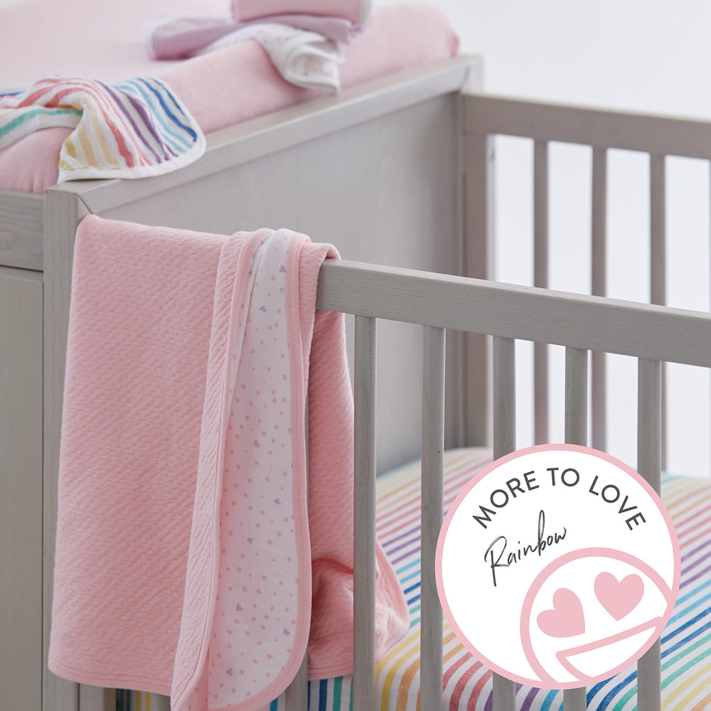 HonestBaby changing pad cover rainbow stripe elastic—secure fit during diaper changes.