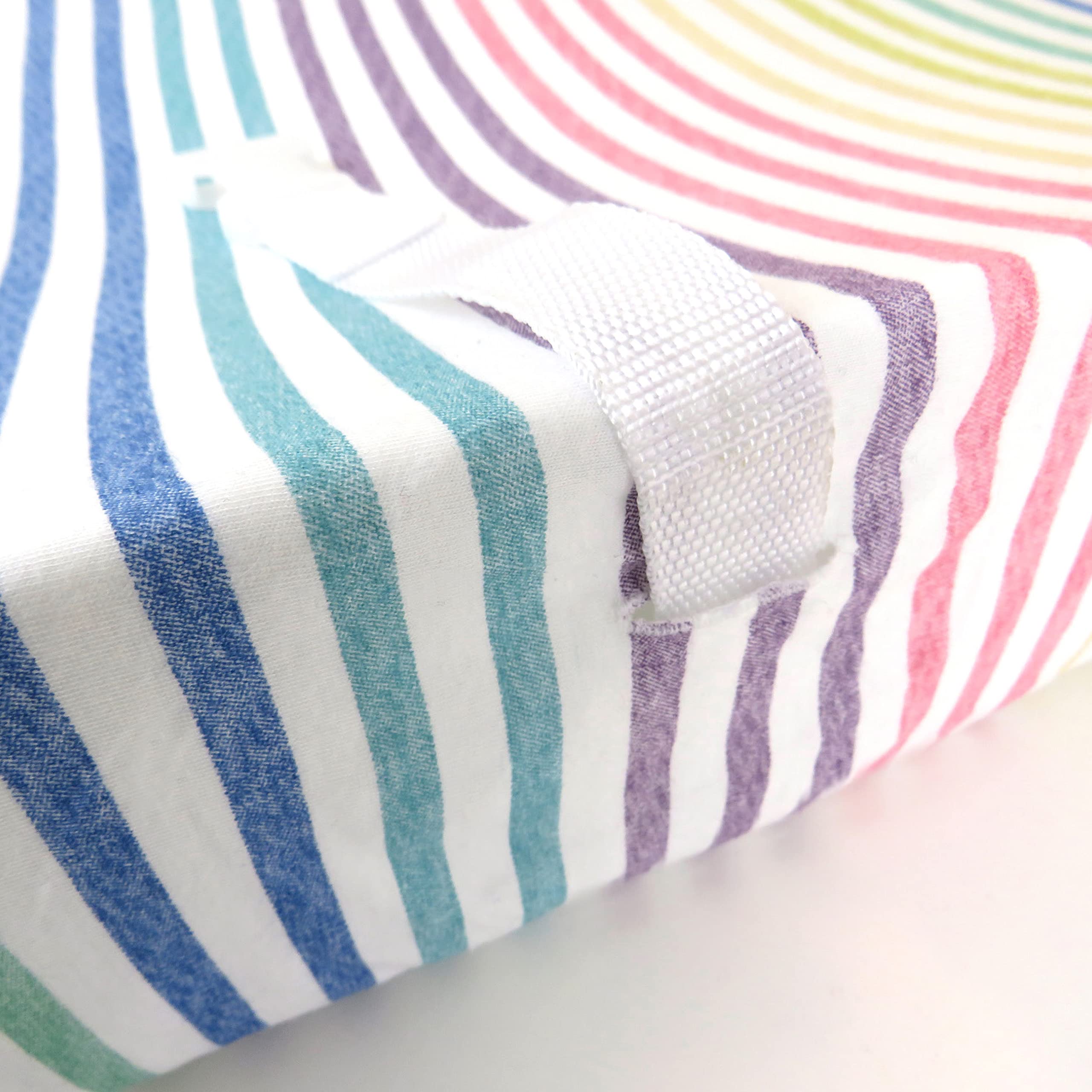 HonestBaby changing pad cover rainbow stripe jersey—breathable for daily use.