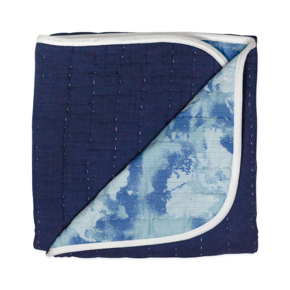 HonestBaby hand-quilted blanket close-up shows soft organic cotton texture.
