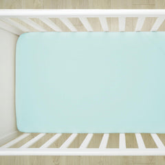 HonestBaby sage crib sheet elastic band ensures secure stay-put fit.