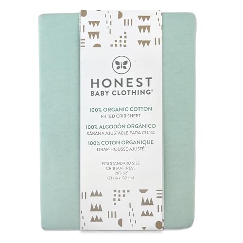 HonestBaby sage crib sheet on mattress demonstrates snug fit.