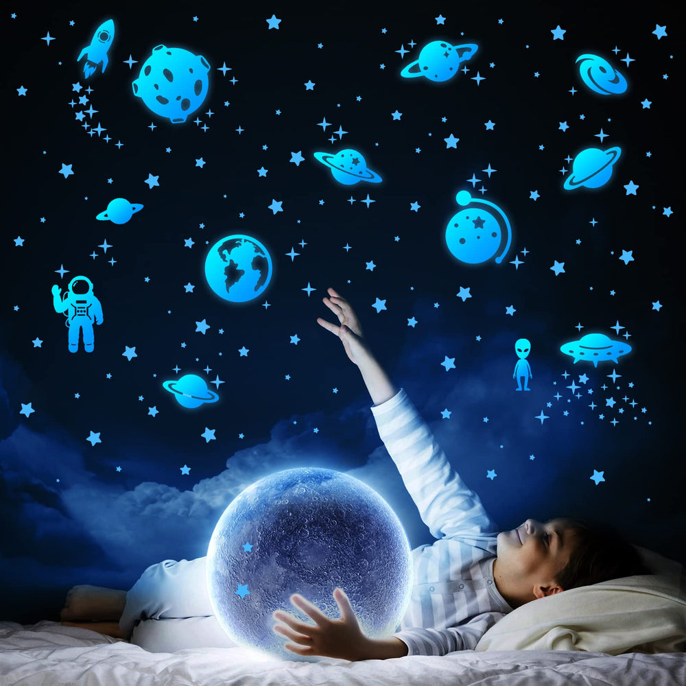 Honeyjoy solar-system-wall-decals-blue bring planets to life in a kid's room.