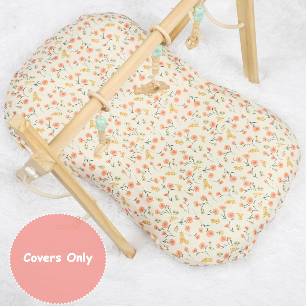 Hooyax baby lounger cover on Snuggle Me demonstrates universal fit and slip-free use.