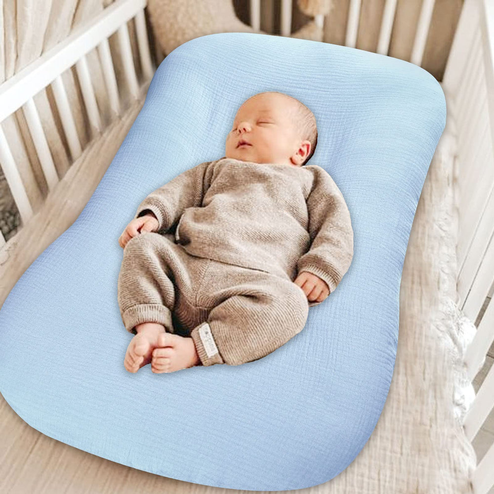Hooyax muslin baby lounger cover brand cards in packaging for new parents.