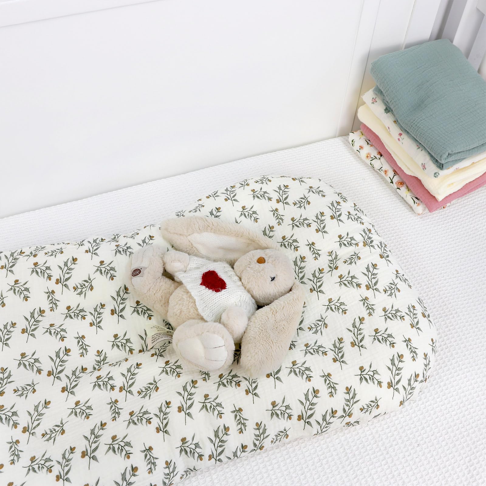 Hooyax Muslin Baby Lounger Cover in use on a baby lounger offers soft, breathable nap space.