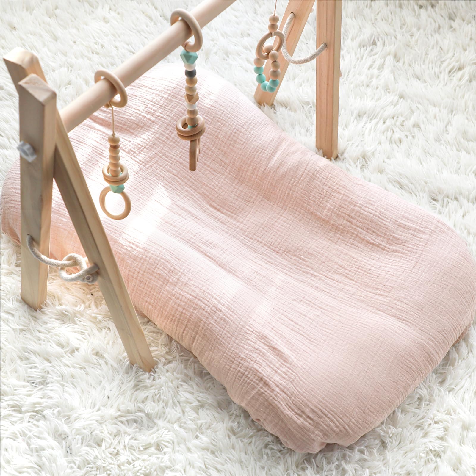 Hooyax light pink cover shown with washer-friendly care and quick-dry benefits.