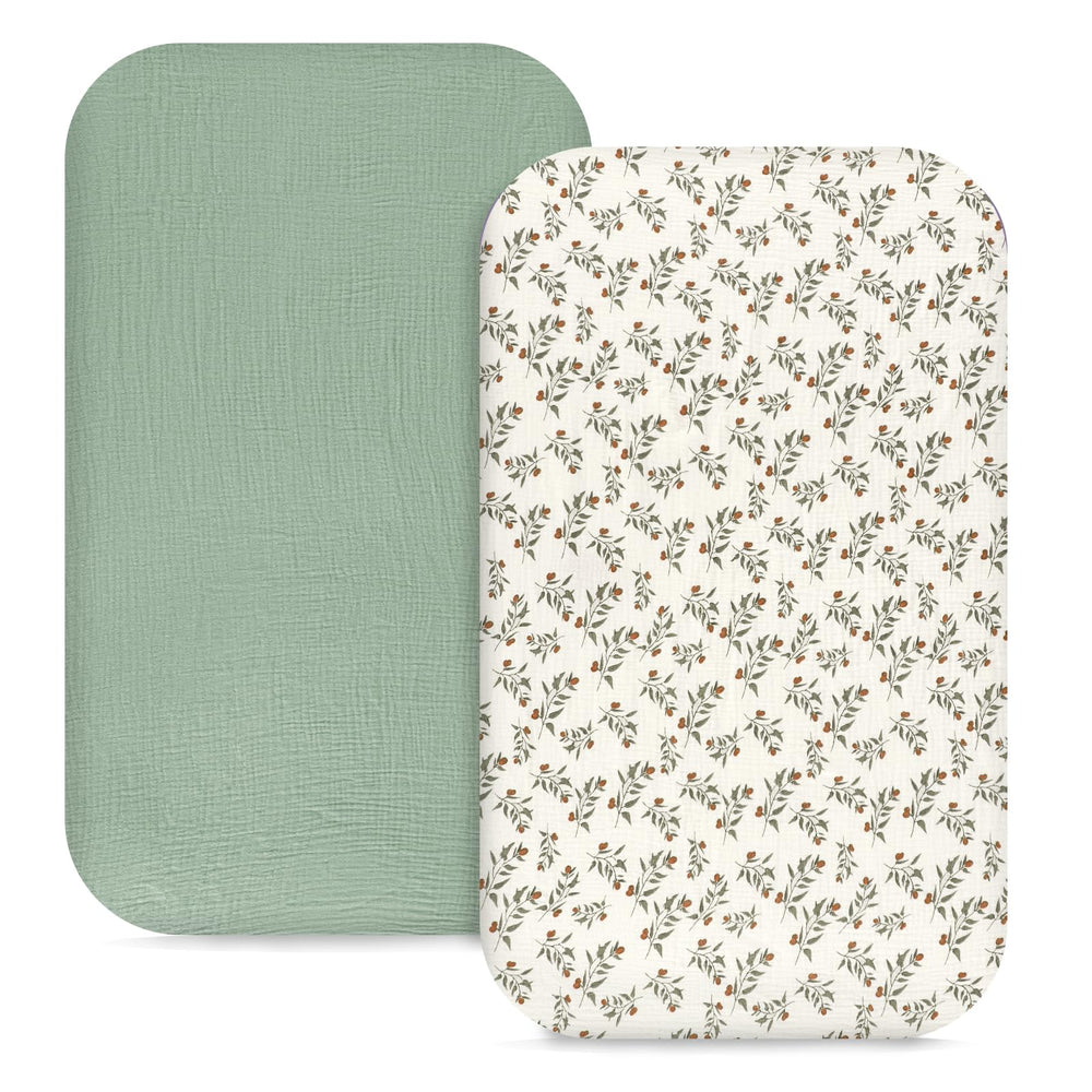 Hooyax muslin bassinet sheets packaging with green leaf design, ideal for gifting.