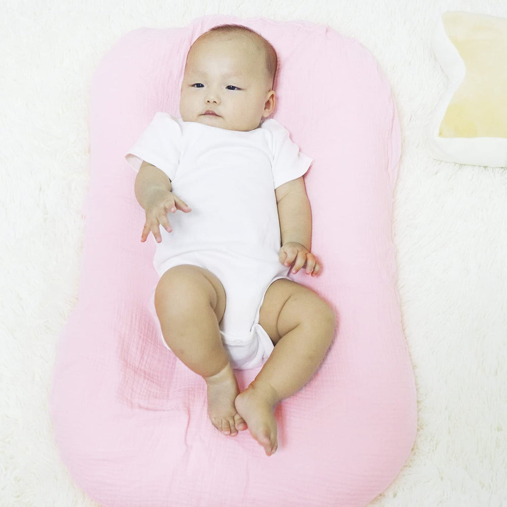 Hooyax muslin lounger cover machine washable for easy cleanup.