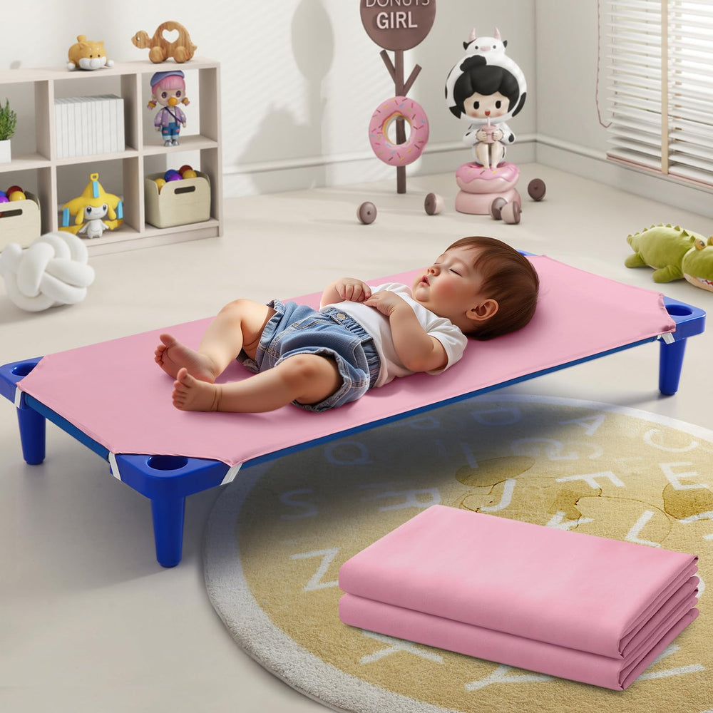 Horbaunal 2-pack pink cot sheets folded neatly for daycare use, ready for nap time.