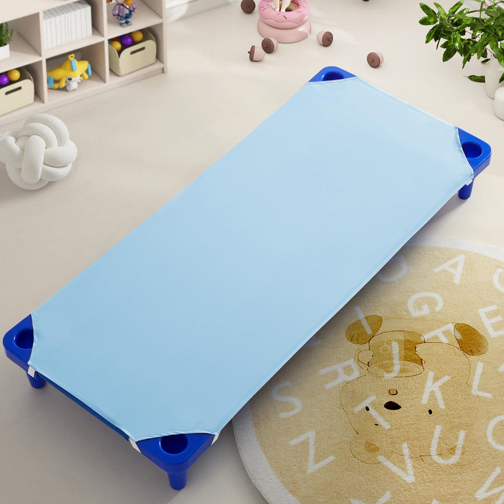 Horbaunal cot sheets on a standard cot demonstrate nap-time readiness and secure comfort