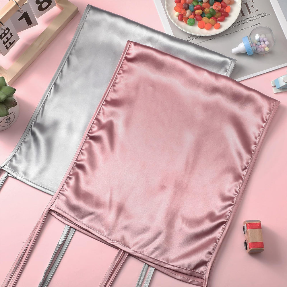 Hosuly satin bassinet sheet with banded edge fits most shapes for secure, easy dressing