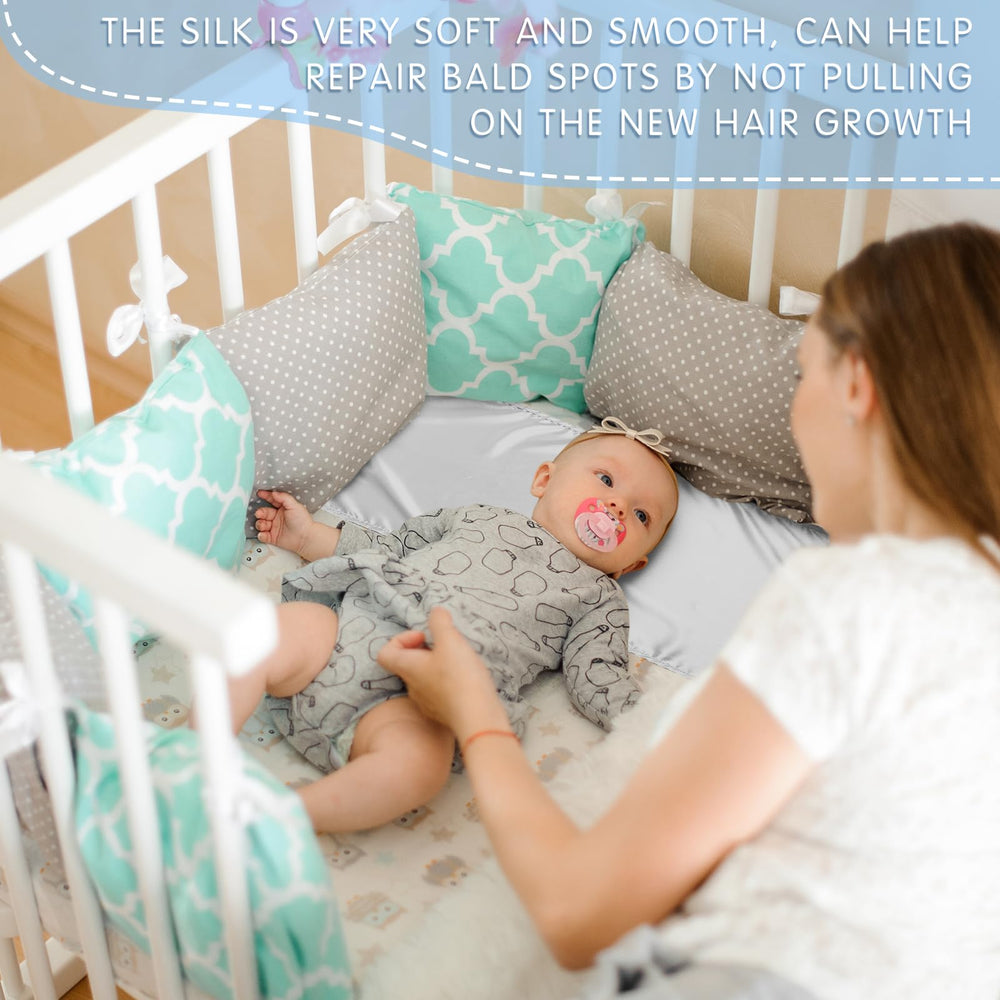 Hosuly satin bassinet sheet in use with baby shows smooth surface reduces friction