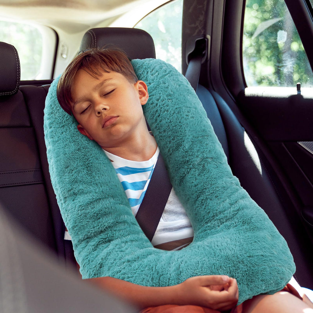 Hoteam compression-recovery turquoise pillow regains fullness after transit.