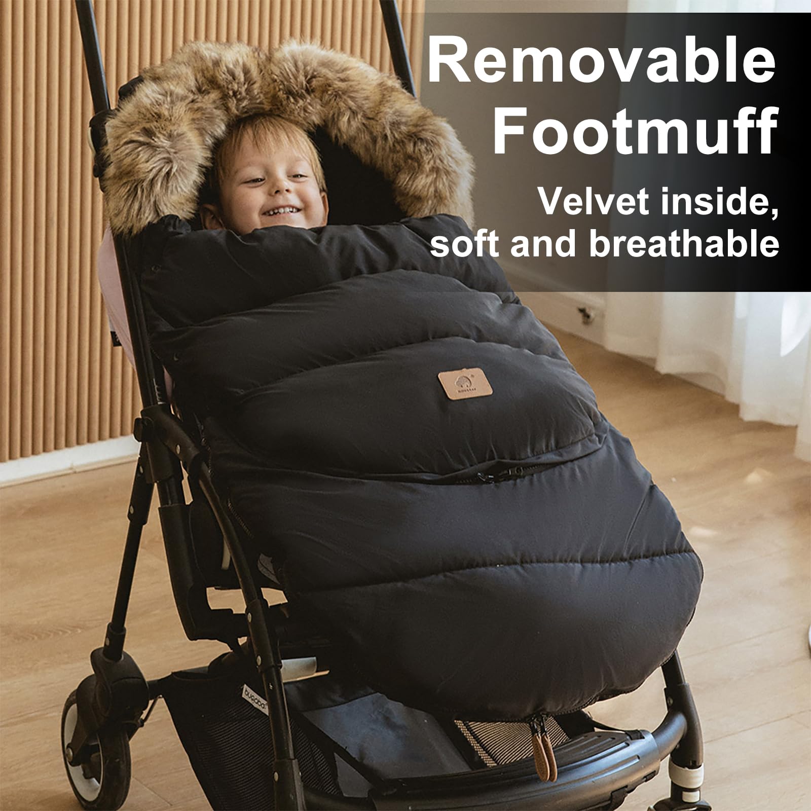 HOUSBAY footmuff oversized fur collar blocks wind around baby's head.