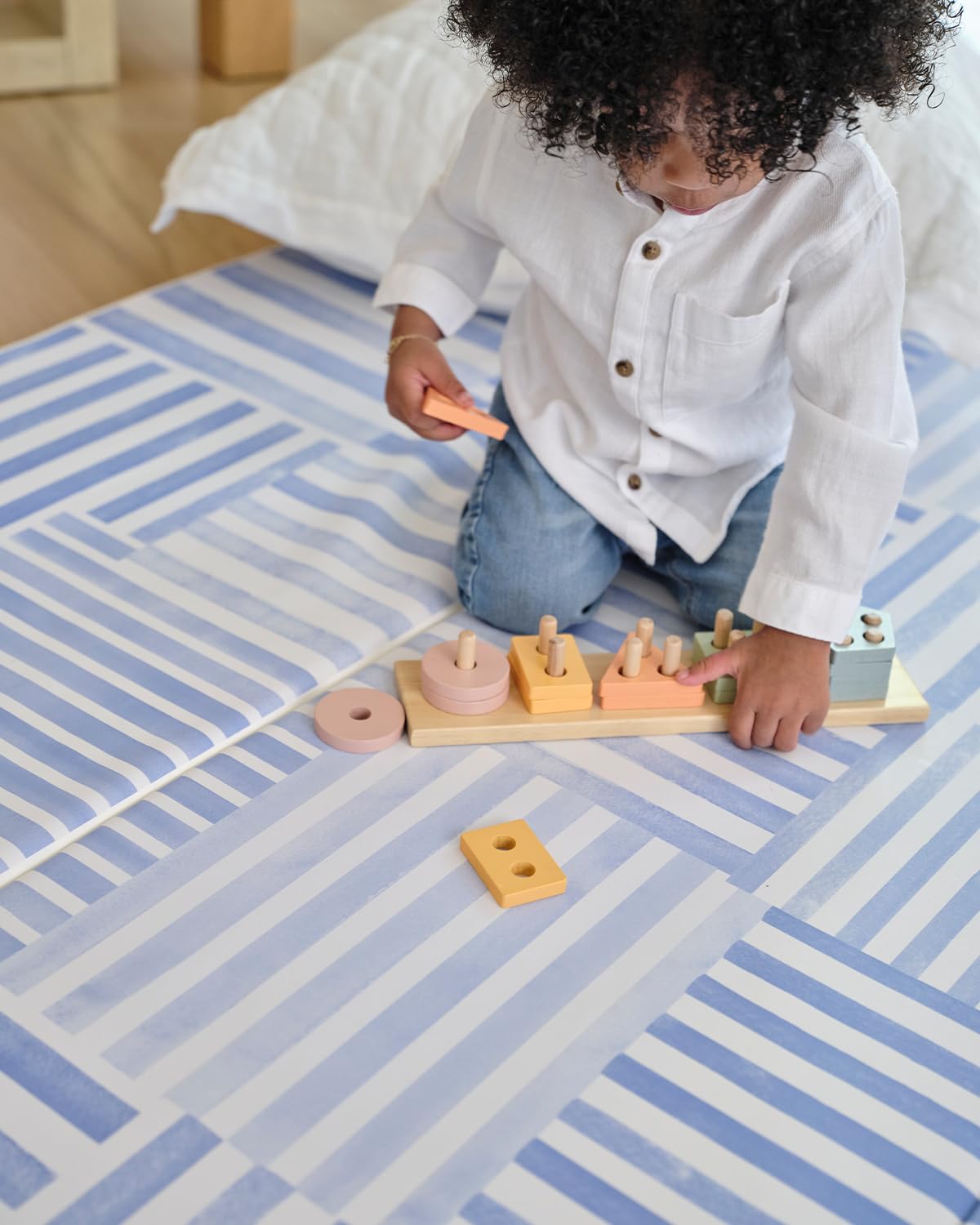 House of Noa Hadley foldable mat laid out for active play; versatile surface supports movement