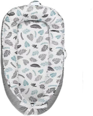 HOVIKOKI Baby Lounger in grey leaves cover shows breathable cotton for comfort.