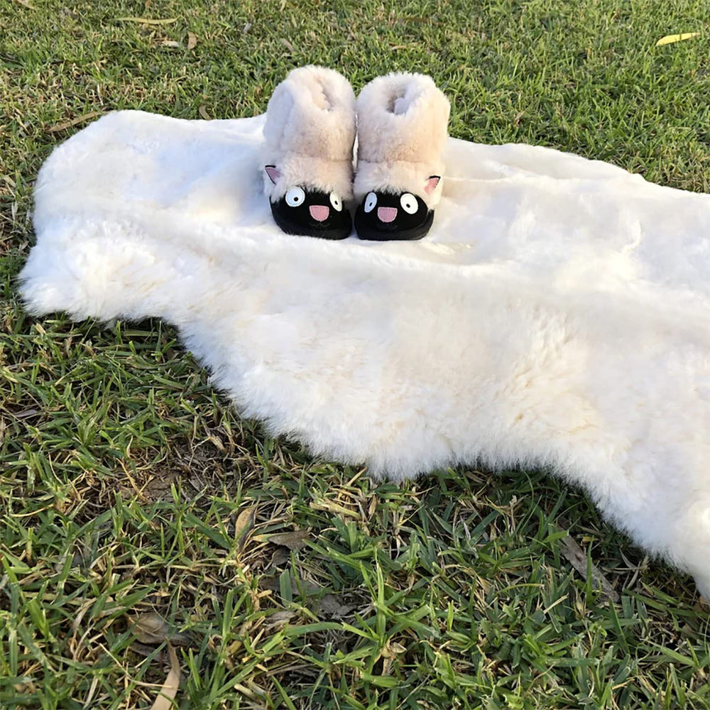 HUAHOO lambskin rug on a play mat provides a gentle surface for tummy time.