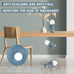 HUAKENER silicone sleeve in dark blue on Avent bottle improves handling during feeds.