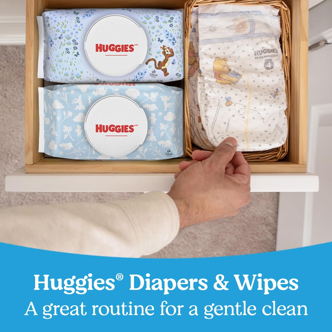 Huggies Natural Care wipes in a diaper bag demonstrate portability for quick refreshes.