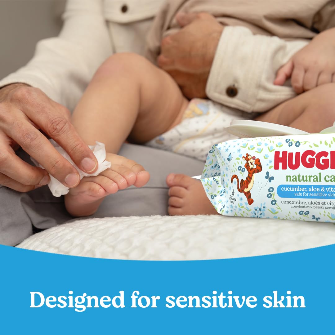 Huggies Natural Care cucumber aloe vitamin E wipes side view emphasizes gentle cleansing with a light fragrance.
