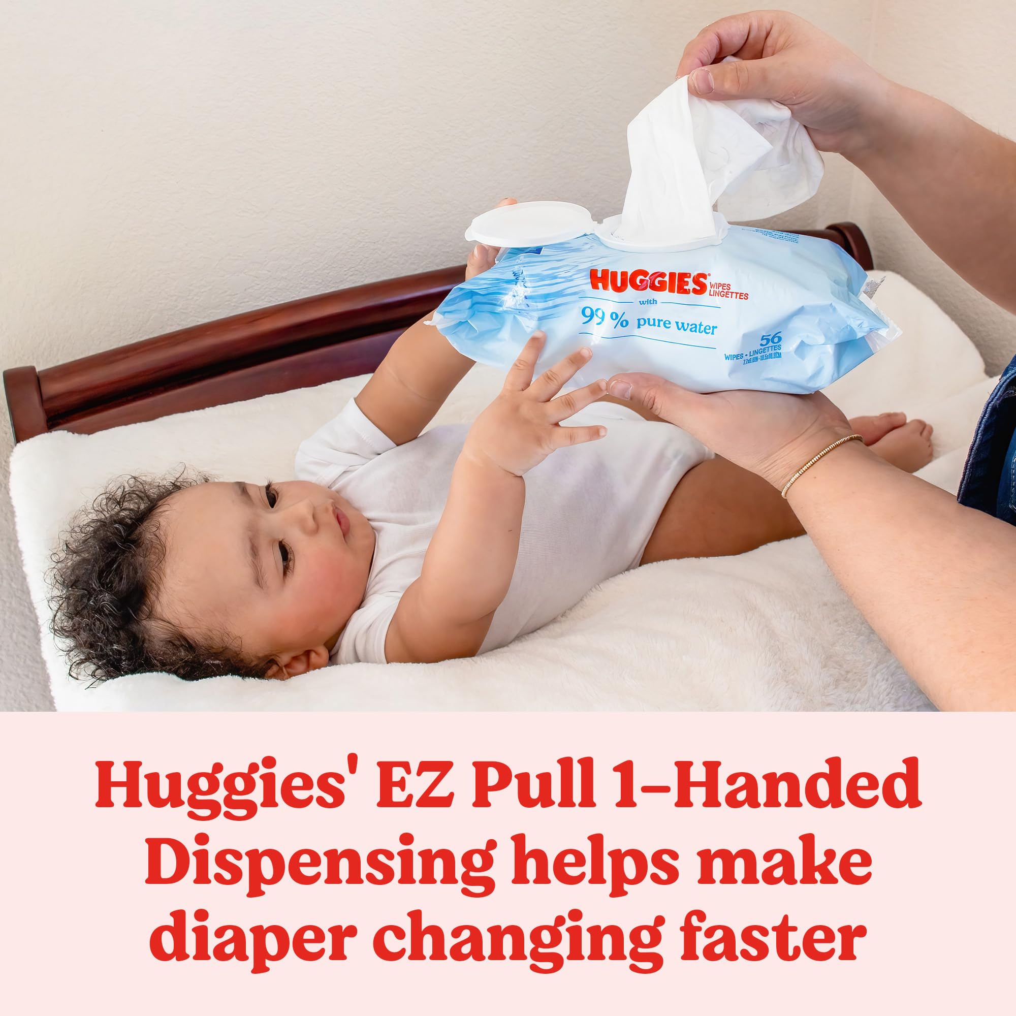 Huggies Pure Water Baby Wipes flip-top dispenser shown for one-handed use