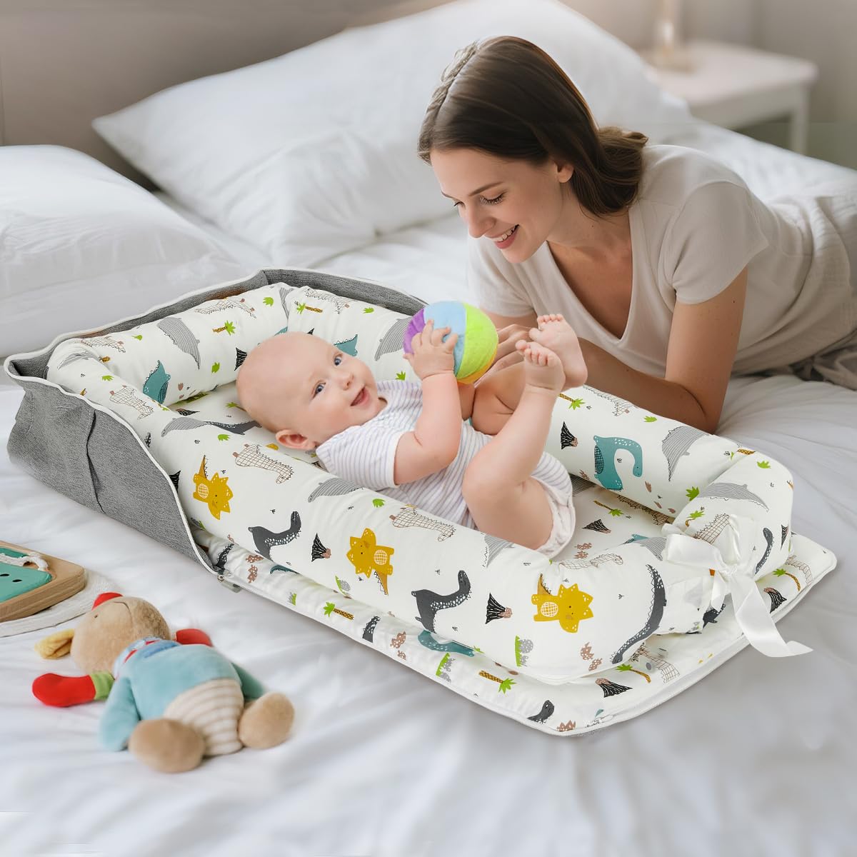 Huggynest baby lounger blue-dinosaur-design adds playful comfort.