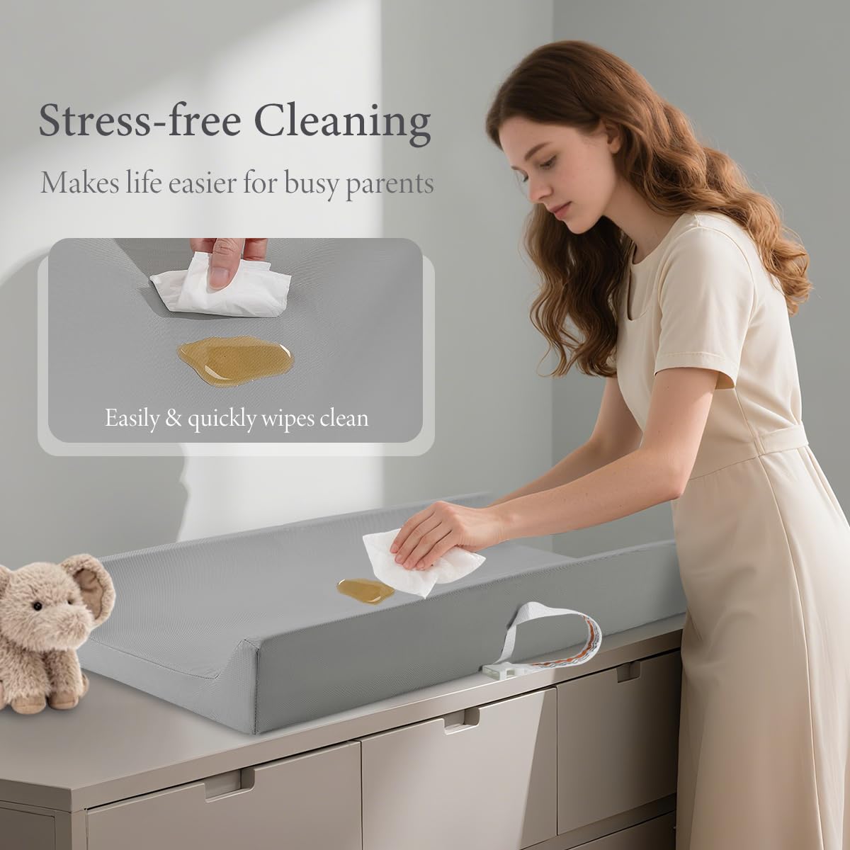 Huggynest changing pad raised edges offer extra protection against rolling.