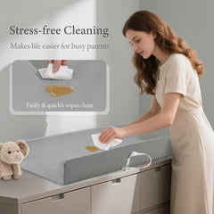 Huggynest changing pad raised edges offer extra protection against rolling.