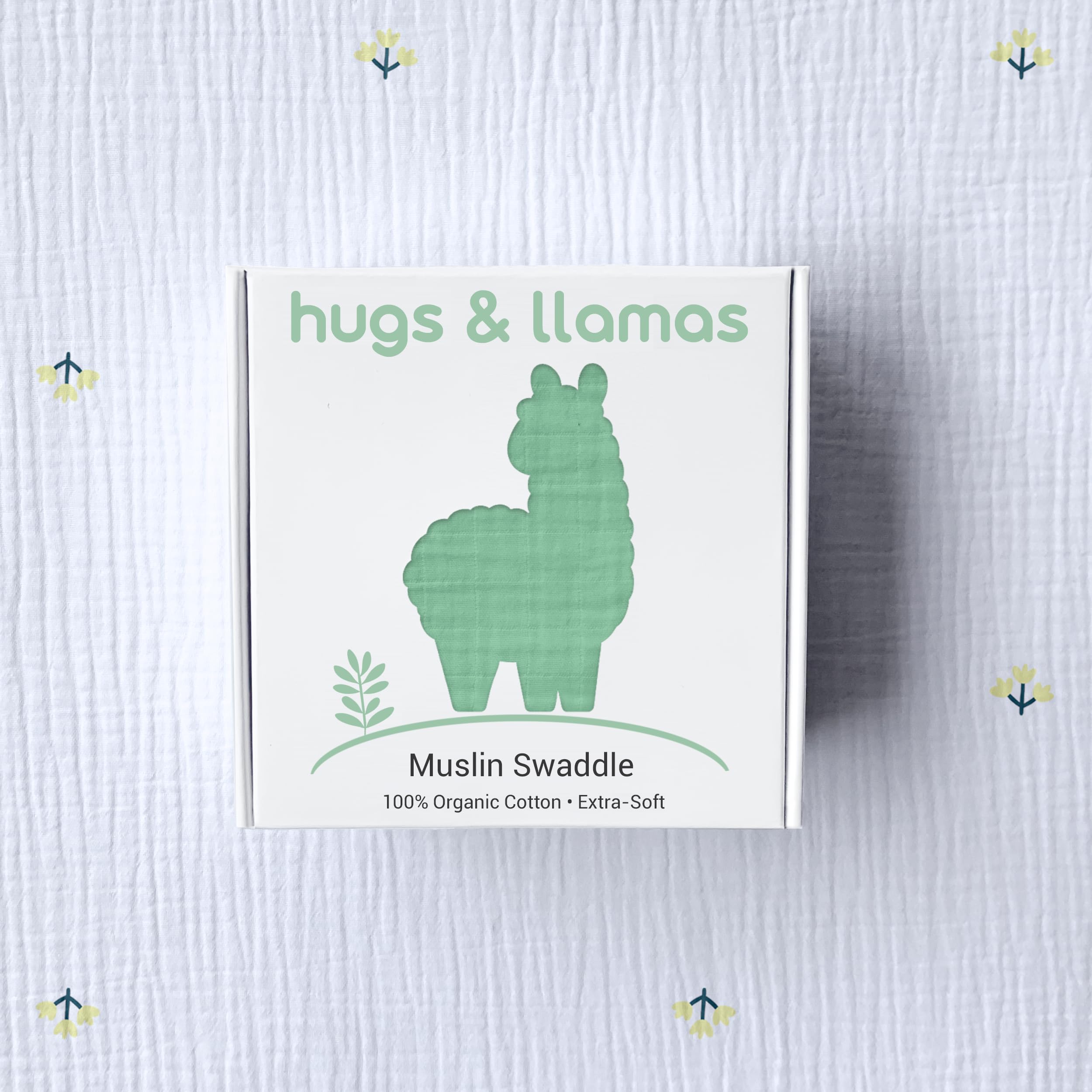 Hugs & Llamas mint color swaddle lifestyle image featuring stylish, gentle infant comfort.