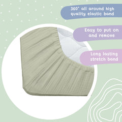 Hugs and Llamas neutral olive color crib sheet in nursery.