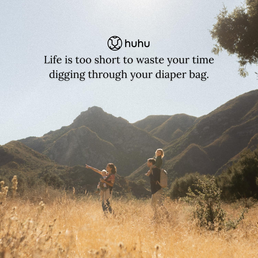 Huhu Diaper Bag Backpack included packing pouches and changing pad showcases practical accessories.