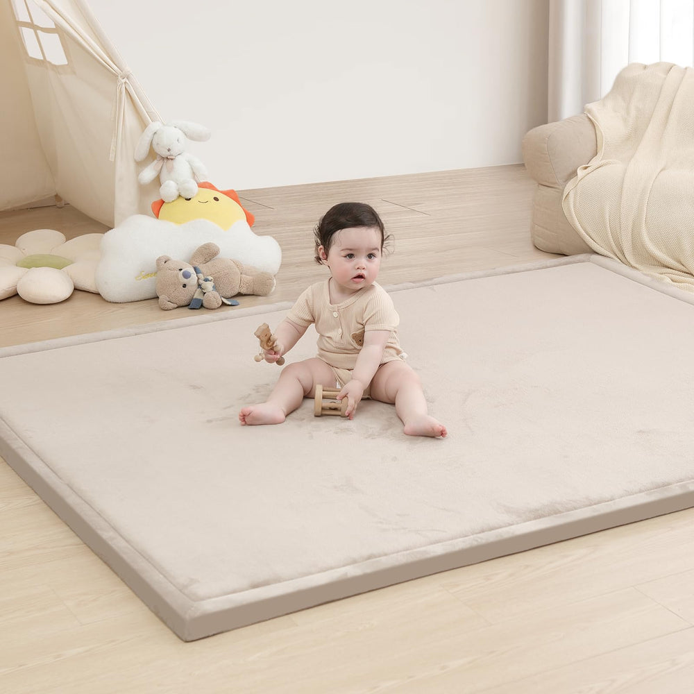 Huloo Sleep baby play mat closeup shows coral velvet texture for comfy, non-slip play.