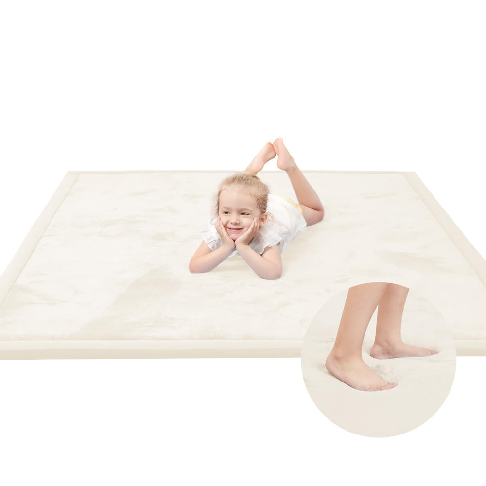 Huloo Sleep baby play mat foam closeup shows thick memory foam for cushioned play.