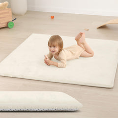 Huloo Sleep baby play mat foam core closeup shows cushioned support for tummy time.