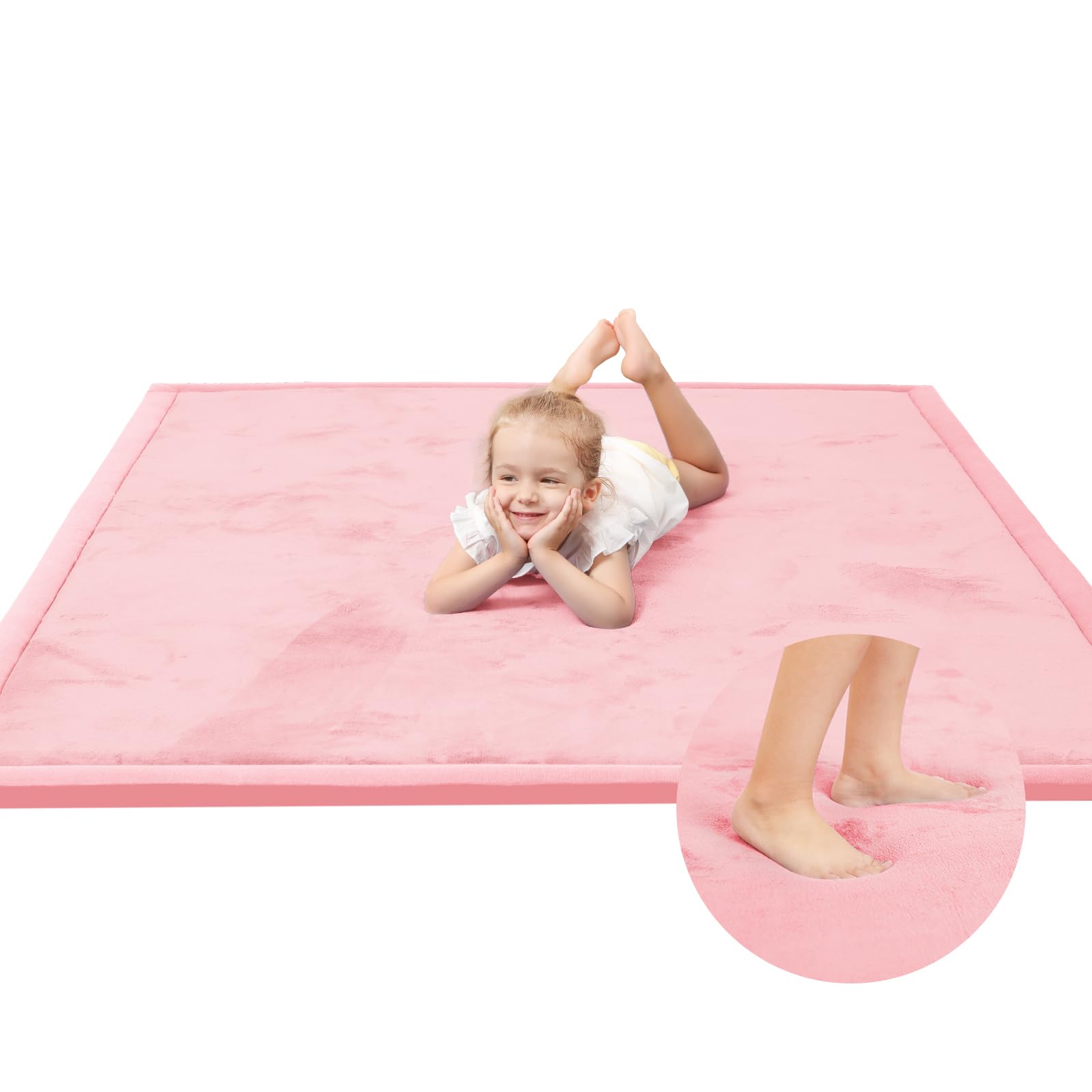 Huloo Sleep pink play mat close-up shows memory foam comfort for safe play.