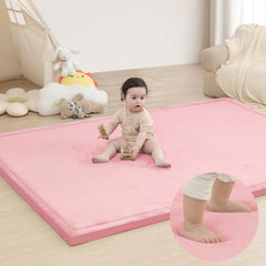 Huloo Sleep baby play mat pink coral velvet close-up highlighting soft surface for cozy play
