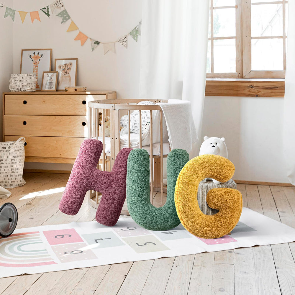 Huraty plush alphabet J-pillow gift-ready packaging signals easy gifting.