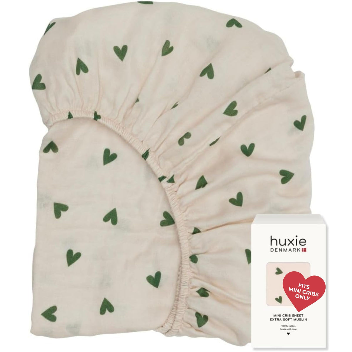 Huxie 24x38 mini crib sheet closeup shows soft texture for baby comfort.