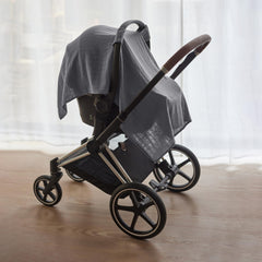 Huxie 43x32 inch car seat cover fits standard car seats and strollers.