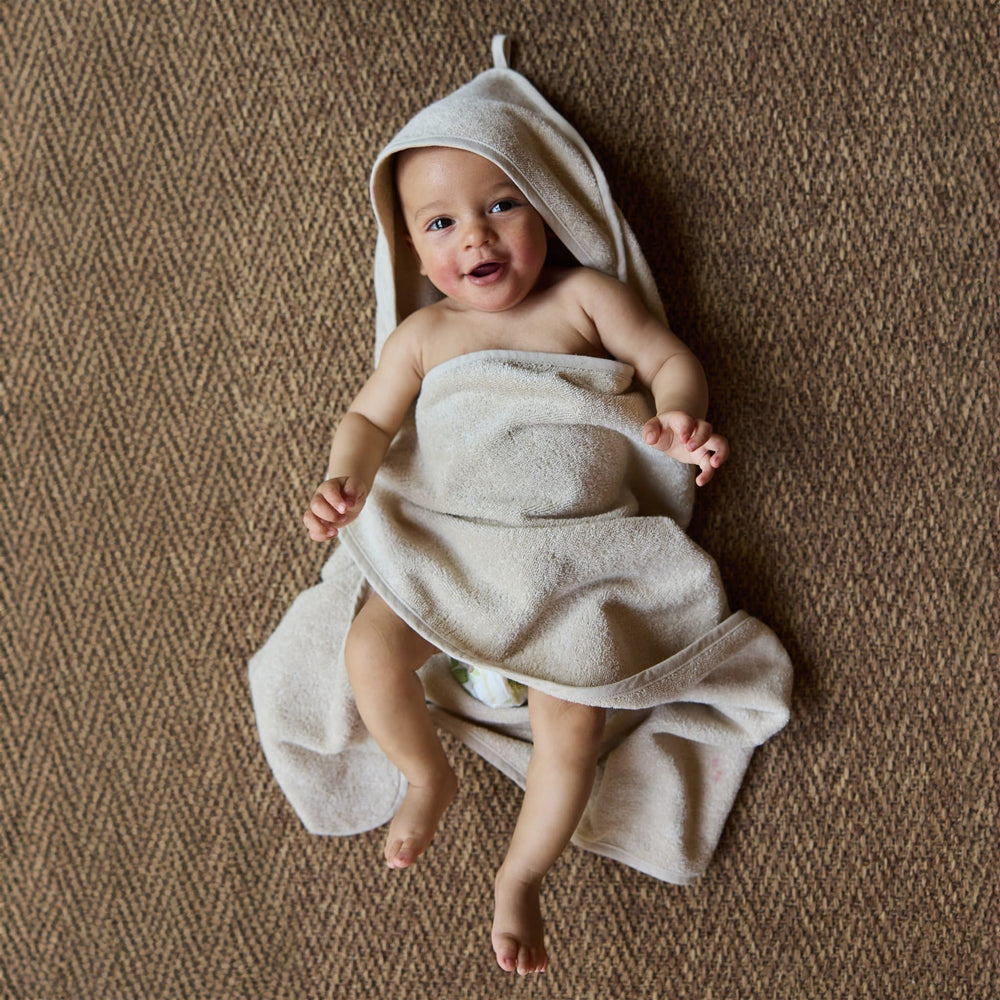 Huxie hooded towel organic cotton 32x32 bath scene shows roomy post-bath comfort