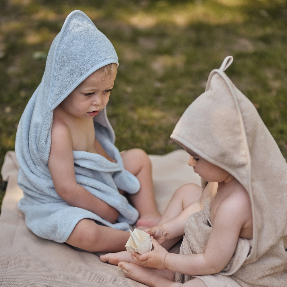 Huxie hooded towel care instructions emphasize easy washing and long-lasting softness