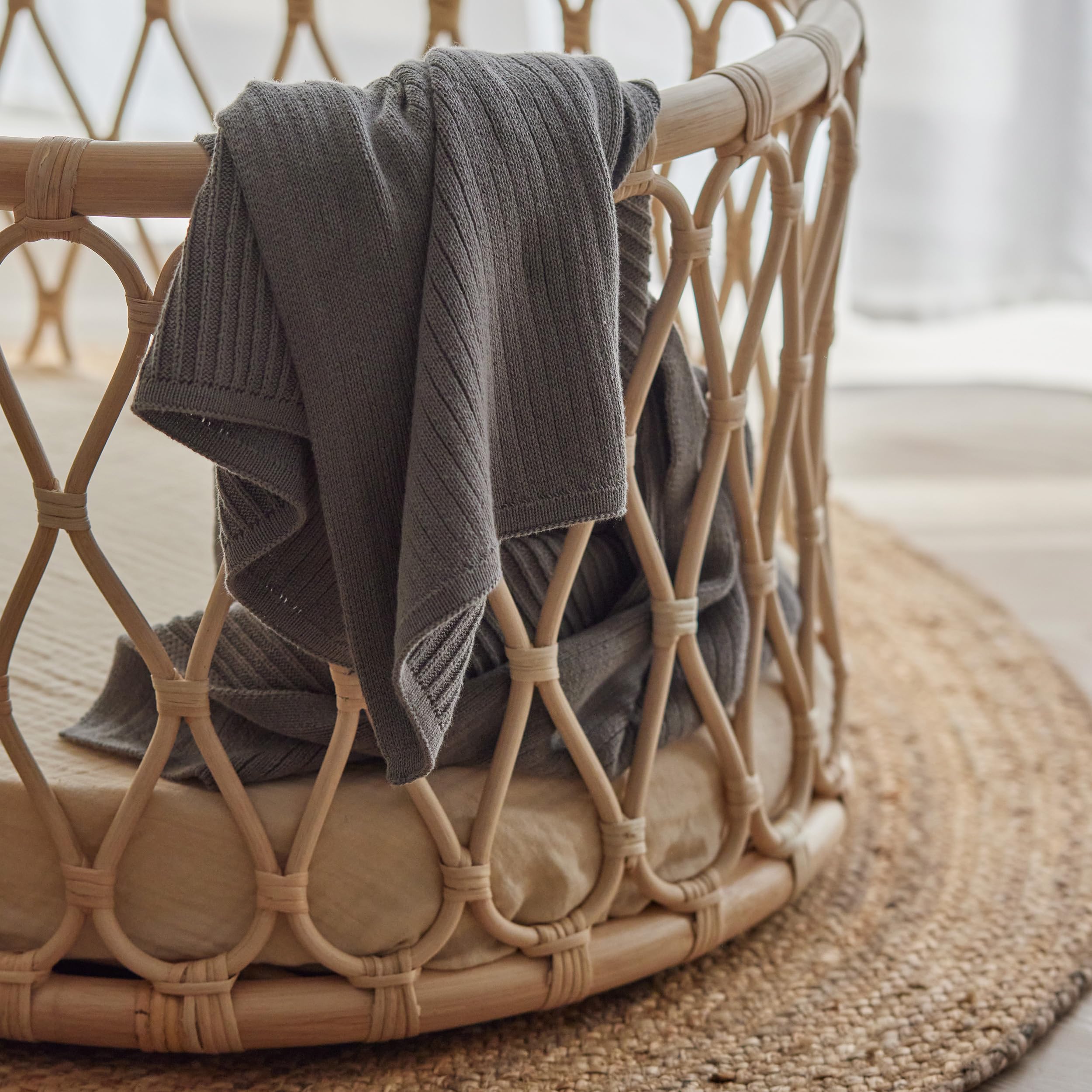 Huxie car-seat travel blanket provides light coverage and comfort.