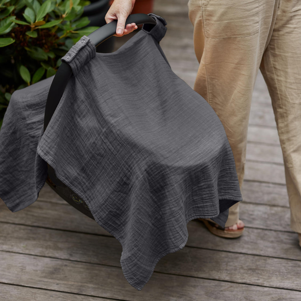 Huxie car seat cover used as nursing cover for on-the-go feeding