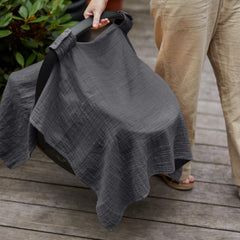 Huxie car seat cover used as nursing cover for on-the-go feeding
