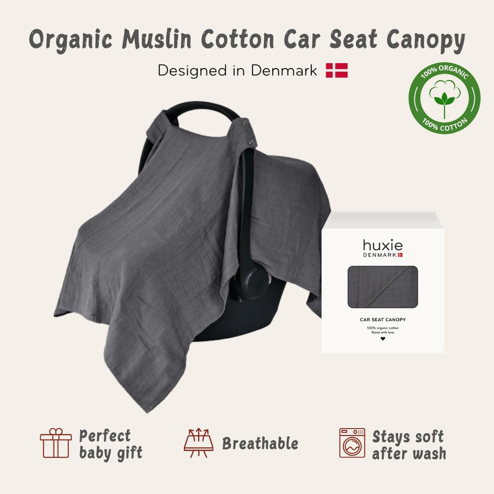 Huxie car seat cover used as nursing cover offering discreet feeding on the go.