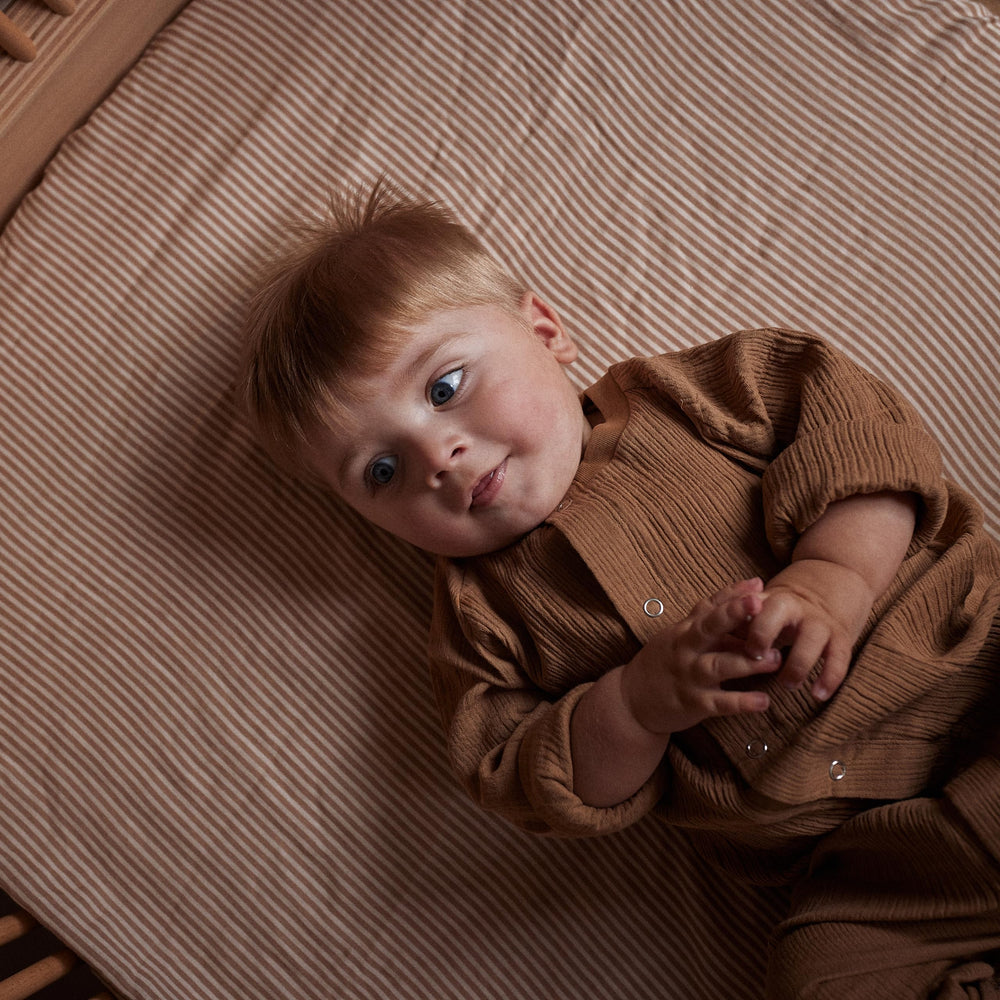 Huxie crib sheets baby-safe breathable fabric feels gentle on skin
