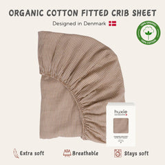 Huxie crib sheets organic cotton closeup highlights breathable fibers