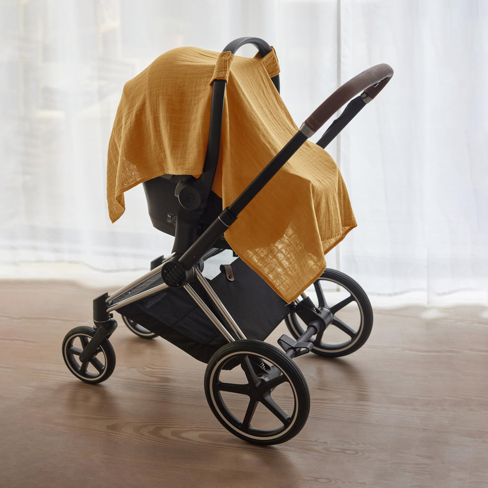 Versatile as nursing cover, swaddle blanket, or changing table cover.