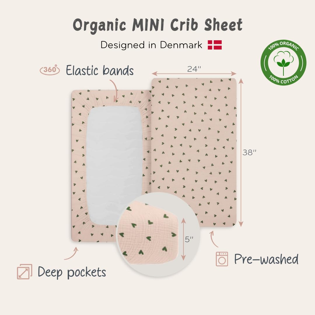 Huxie green hearts design on sheet emphasizes gender-neutral calming aesthetic.